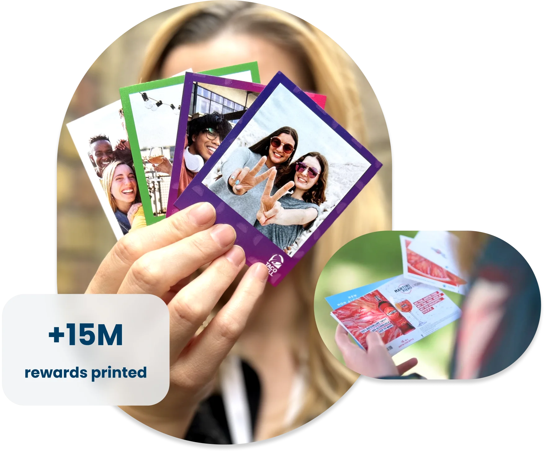 A person holding a fan of colorful printed photo cards, each featuring smiling people in various settings. The largest card in front shows two women making peace signs. In the corner, an inset image shows someone holding printed photo rewards with branded advertisements on the back. A text overlay reads “+15M rewards printed.”